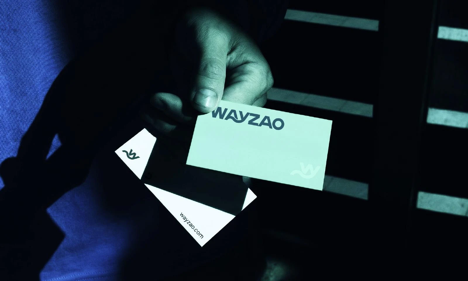 WayZao business card identity mockup in teal and dark colors